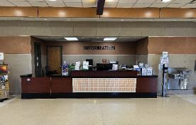 Airport information desk with lower counter for wheelchair users